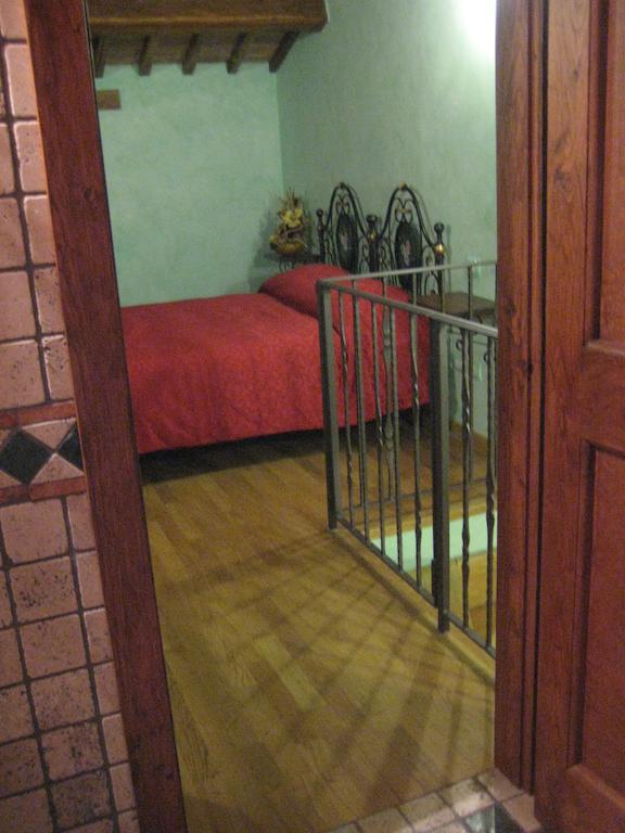 Готель La Casa Di Ercole Беванья Номер фото